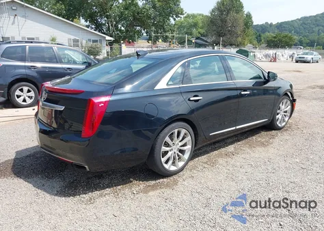 2015 Cadillac Xts Luxury from USA, damaged, VIN 2G61M5S31F9117522